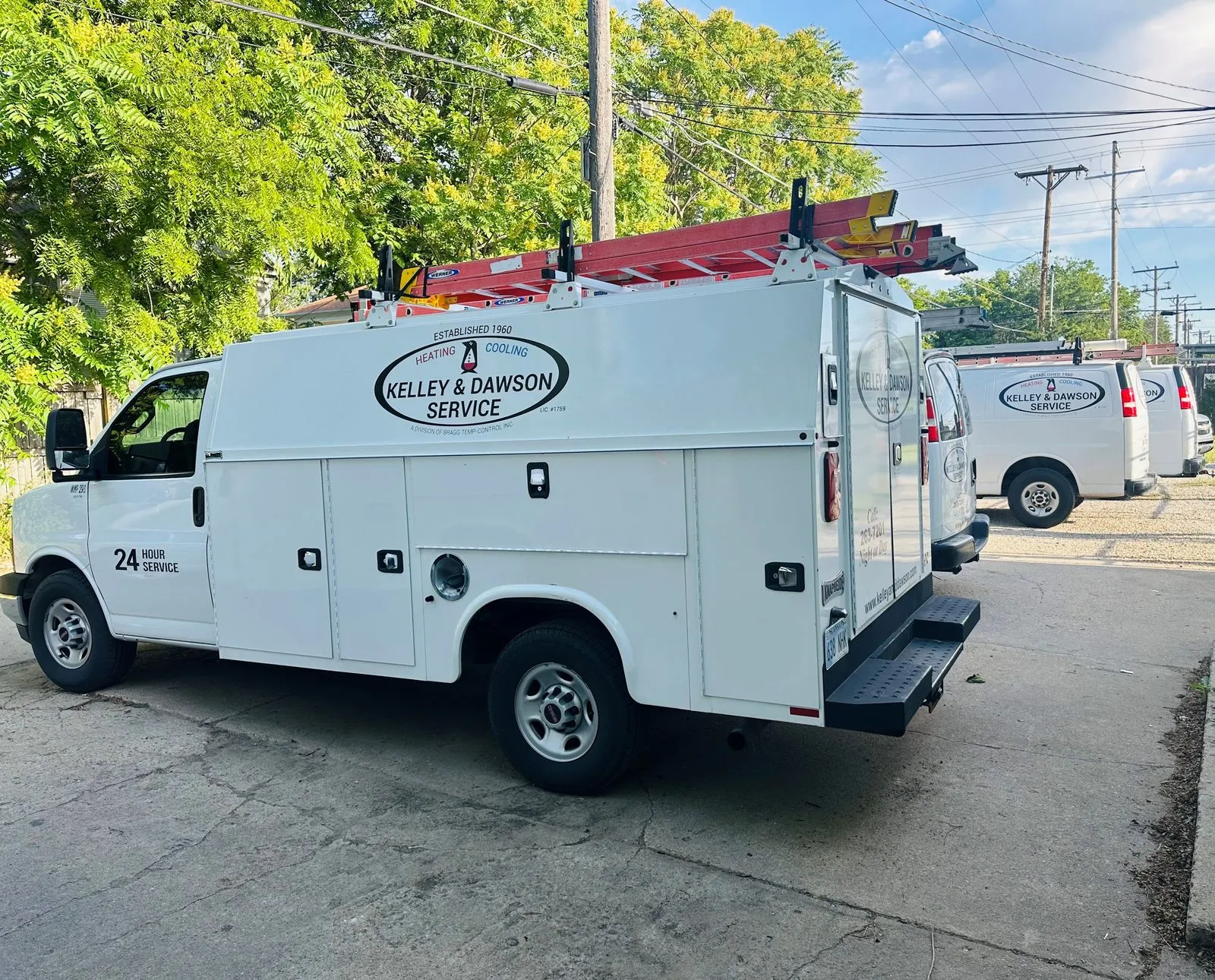 Kelley & Dawson Service trucks lined up outside the North Broadway shop in Wichita, KS