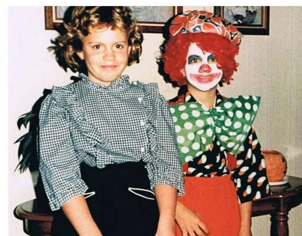 Kelley & Dawson family throwback photo of two kids in Halloween costumes
