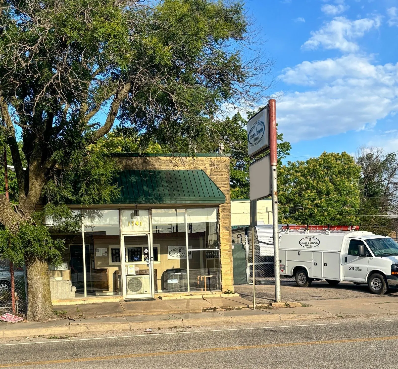 Kelley & Dawson Service storefront in Wichita, KS with a 24-hour service truck parked outside